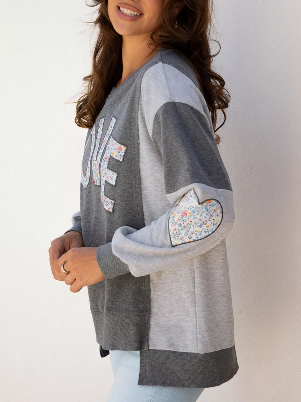 LOVE Graphic Exposed Seam Patchwork Uneven Hem Chic Sweatshirt